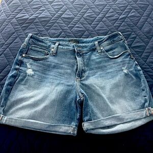 Silver boyfriend shorts.